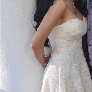 Beautiful dress. It is a size 00 and from Bebe.